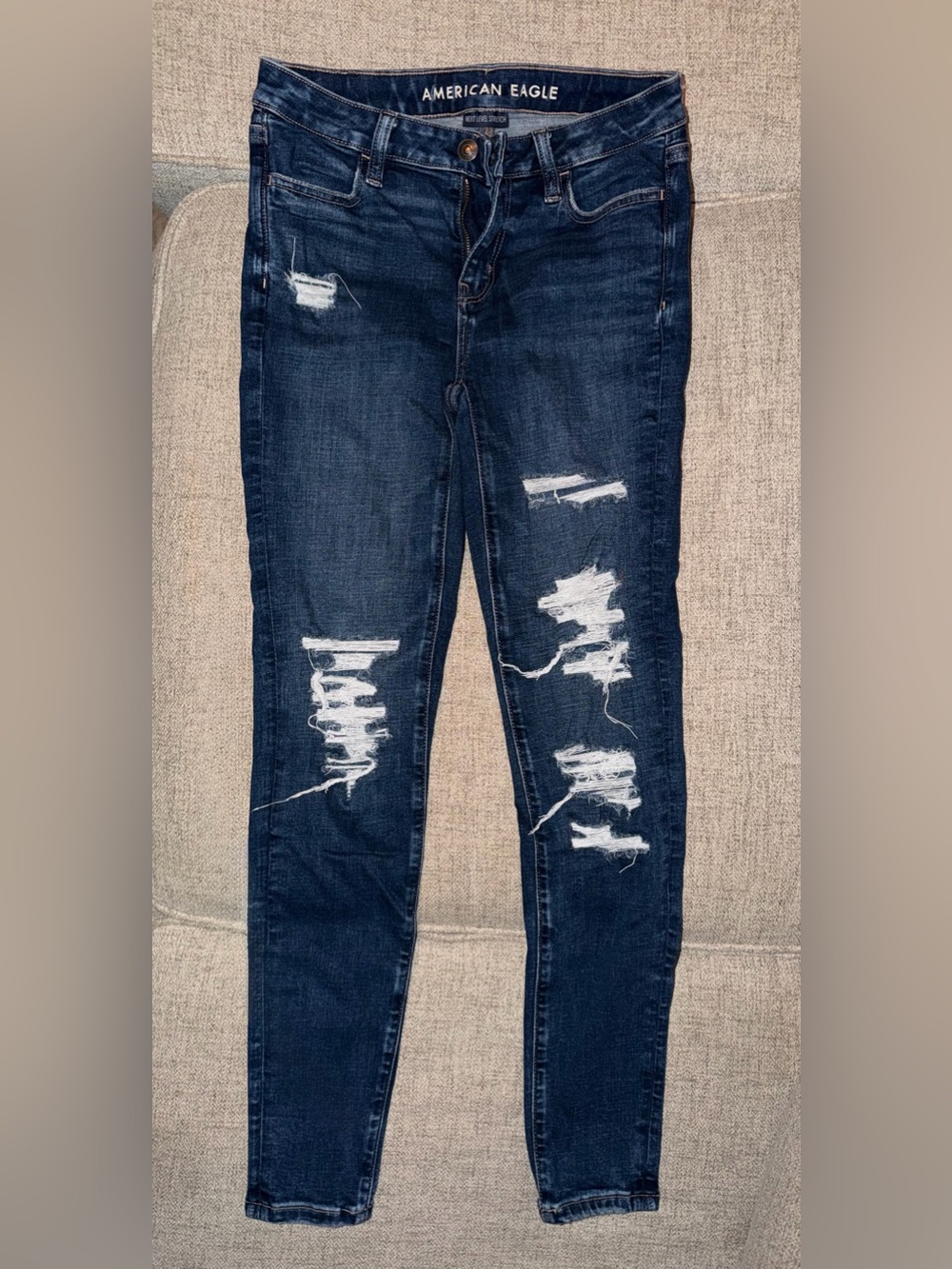 American Eagle Dark Wash Low-Rise Distressed Skinny Jeans